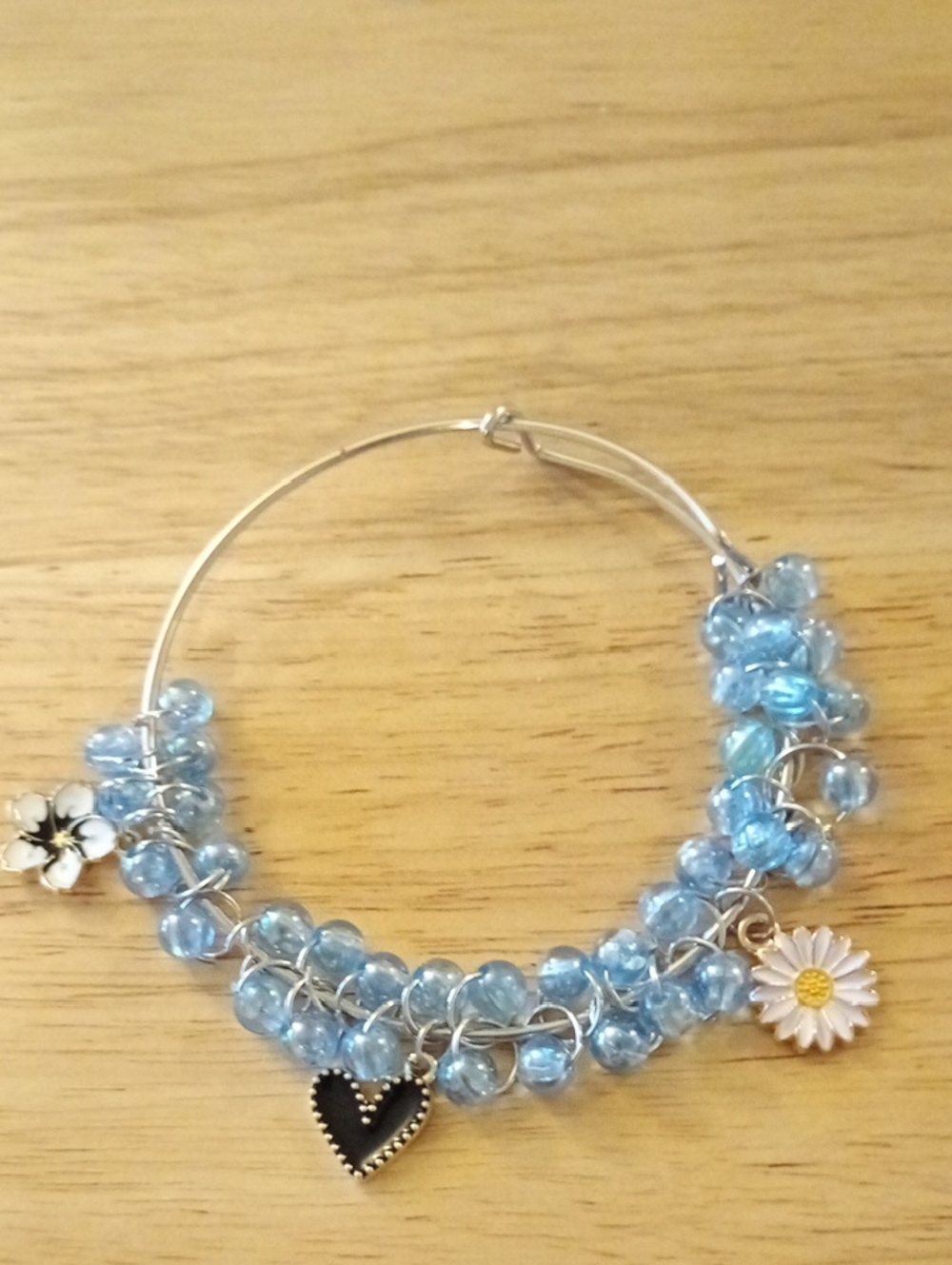 Light Blue Beaded Charm Bracelet with Flower and Heart Accents